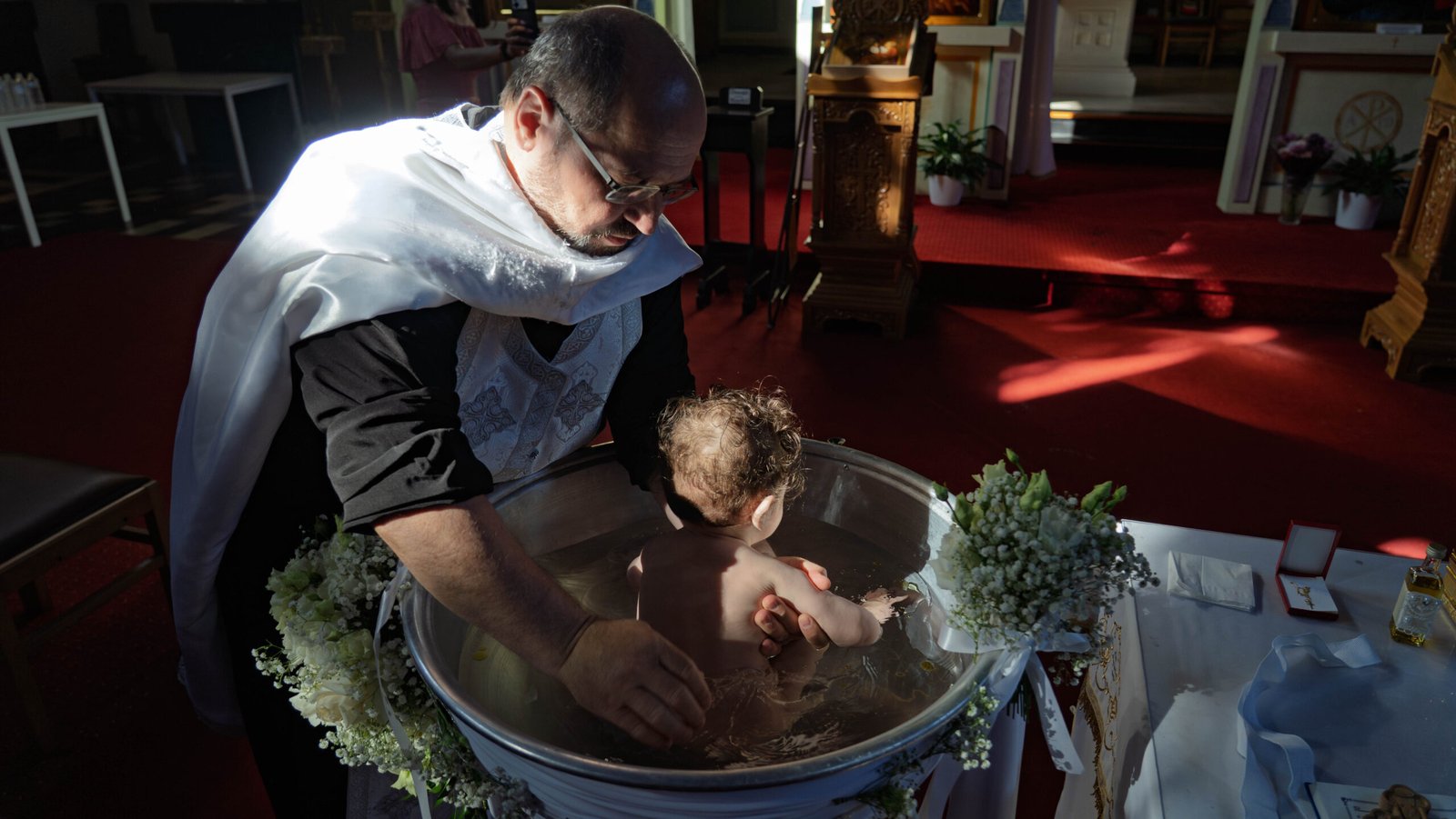 Baptism photographer in Brussels, baby christening ceremony
